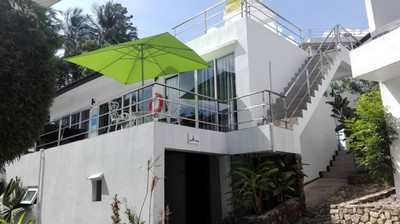 villa Paris arriving view of the terrace and the swimming pool .